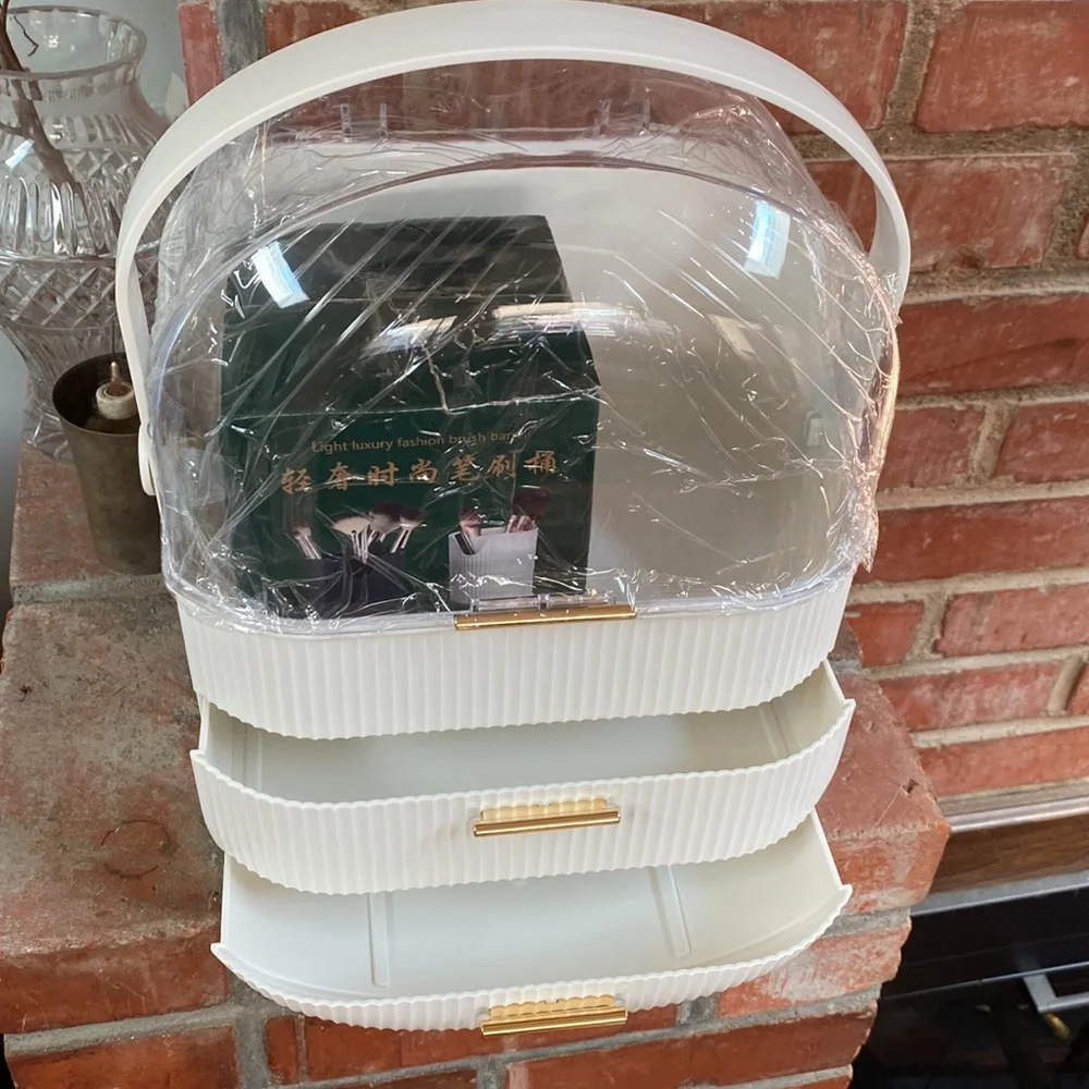 Egg shape makeup organizer case with drawers